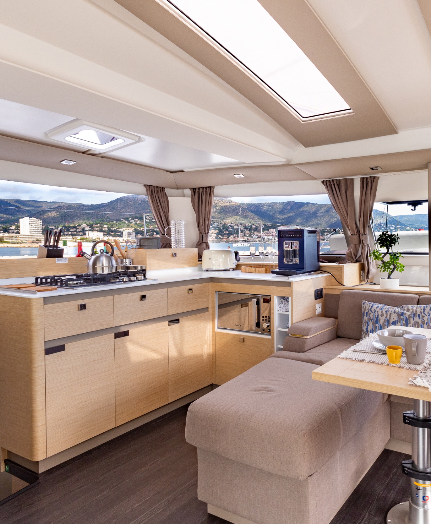 Fully equipped galley aboard HONU MOANA with coffee machine and gas hob